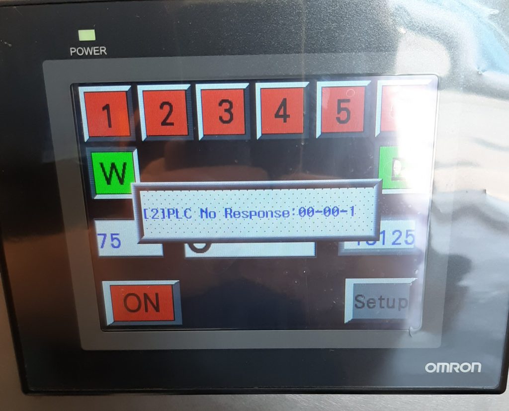 HMI fault message showing PLC communication error during troubleshooting